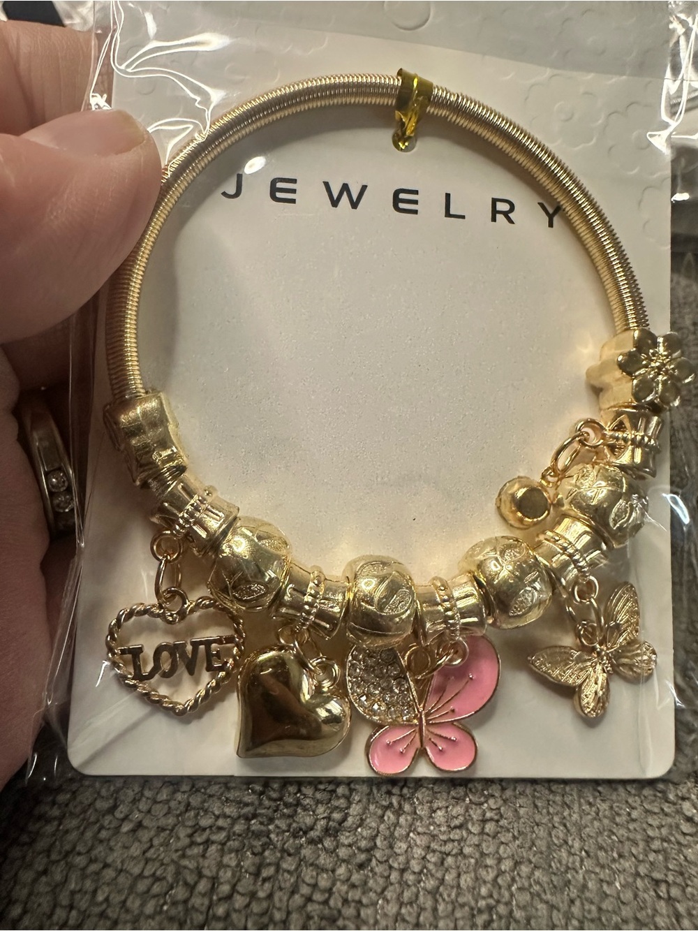Butterfly Dsigns Gold Charm Bracelet with Pink Butterfly and Heart Accents
